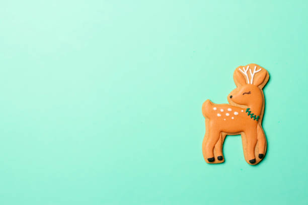 istock Christmas composition with decorations and cookies on a mint background 1357697845