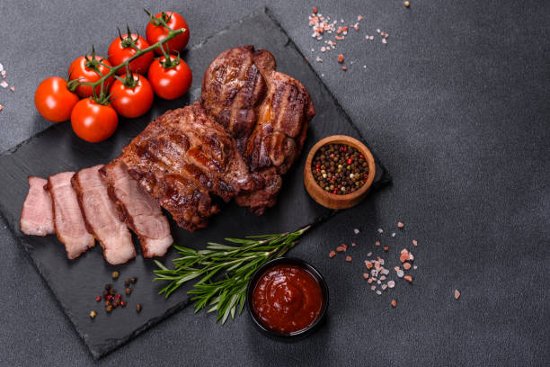 istock grilled beef steaks with spices on a dark cutting board 1357698740