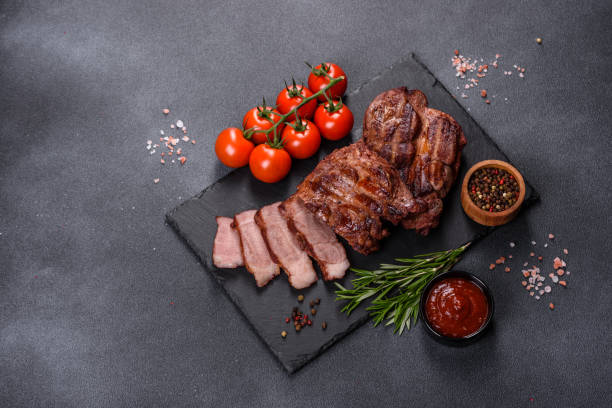 istock grilled beef steaks with spices on a dark cutting board 1357698846