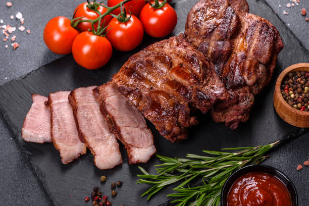 istock grilled beef steaks with spices on a dark cutting board 1357698847