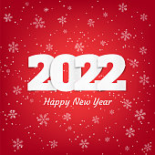 istock Happy New Year 2022 background, banner with falling snow and snowflakes on red background. Merry Christmas Greeting card, brochure or banner template. Stock Vector illustration. 1357702349