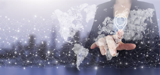istock Global world telecommunication network. Hand touch digital screen hologram world, earth, map, globe sign on city light blurred background. Global technologies concept. 1357704004