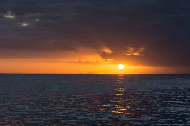 istock Sunset on the Atlantic Ocean on a cloudy day. 1357717474