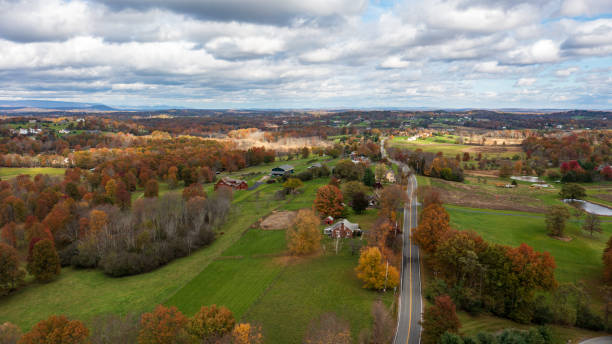 istock A high angle view over Goshen, New York on a beautiful day with colorful fall foliage. 1357717882