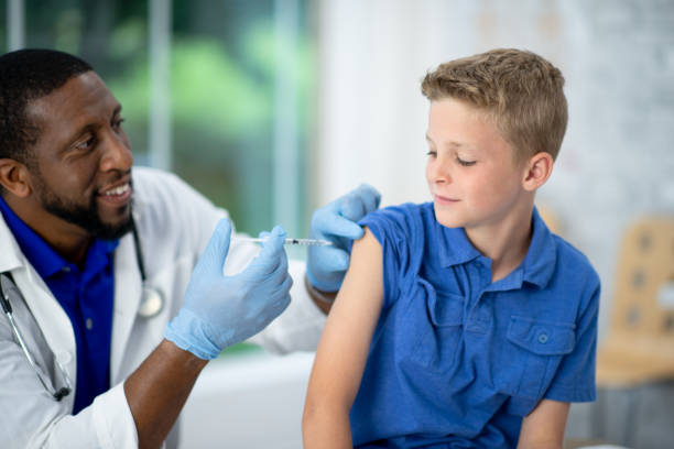 istock Apprehensive Young Patient Receiving a Vaccine 1357720000