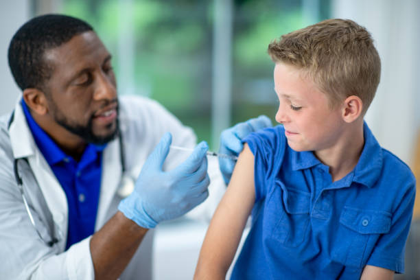 istock Apprehensive Young Patient Receiving a Vaccine 1357720001