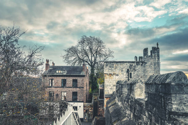 View of the ancient battlements above one of the entrance gates through the city walls of York in England.