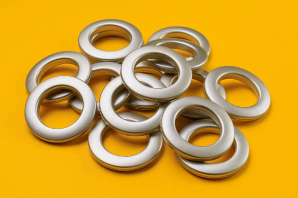 istock Matte eyelets for curtains on a colored background. Decor element for creating home comfort in interior design 1357721724