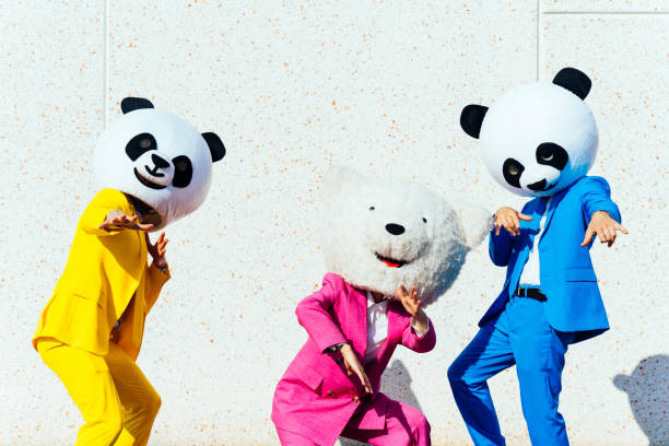 istock Storytelling image of people wearing giant panda head 1357722895