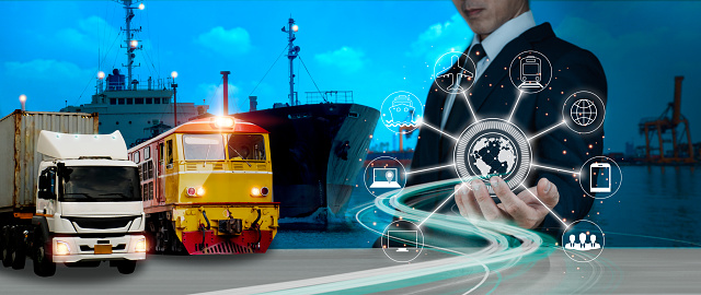 A businessman uses his hands on a logistic network distribution and smart transportation and networking intelligent logistics of truck and railway container cargo ship, logistic import export.