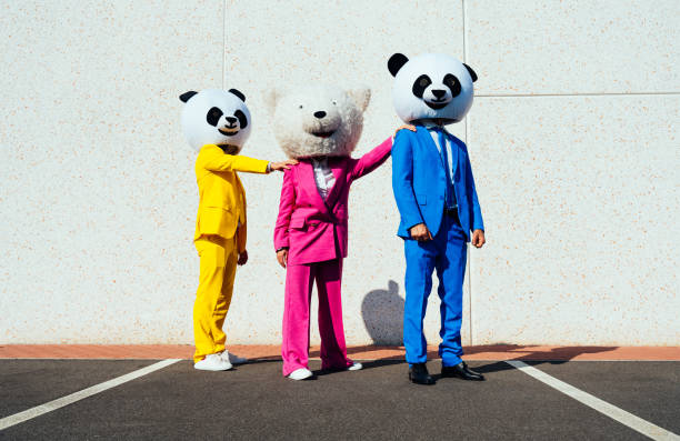 istock Storytelling image of people wearing giant panda head 1357723036