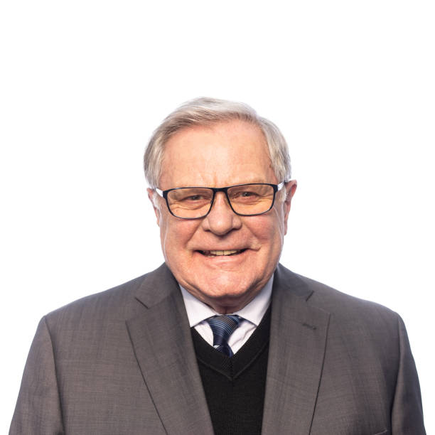istock Studio portrait on white of a senior man smiling 1357723131