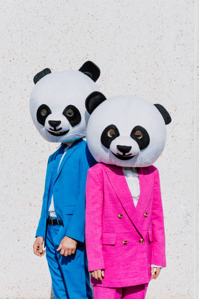 istock Storytelling image of a couple wearing giant panda head 1357724094