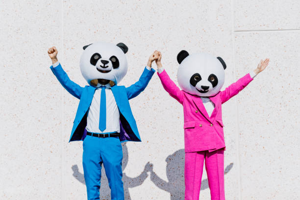 istock Storytelling image of a couple wearing giant panda head 1357724221