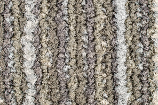 istock Seamless close up of monochrome grey carpet texture background from above. 1357724721