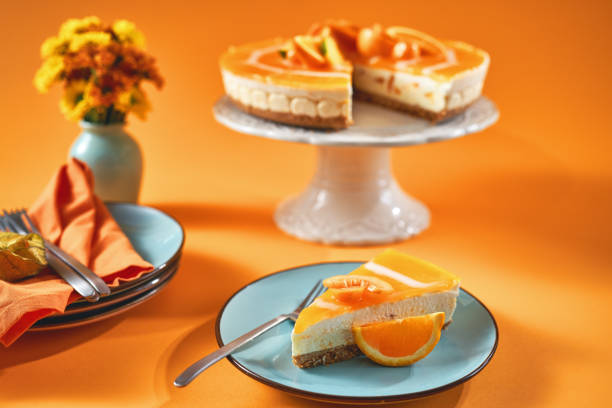 istock Creamy Orange Cheesecake with Whipped Cream 1357725586