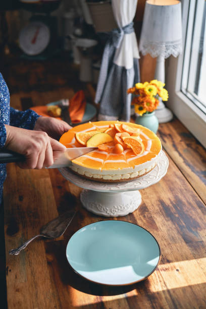 istock Creamy Orange Cheesecake with Whipped Cream 1357725605