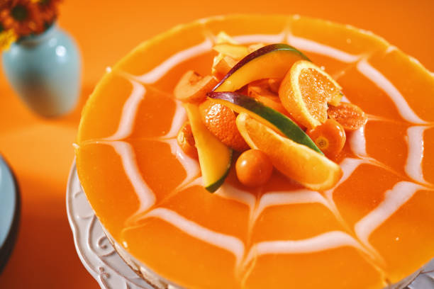 istock Creamy Orange Cheesecake with Whipped Cream 1357725610