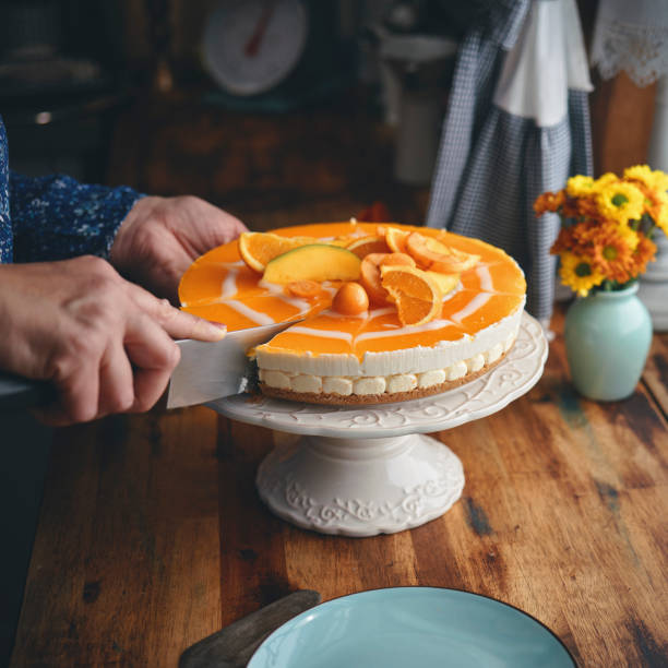 istock Creamy Orange Cheesecake with Whipped Cream 1357725613