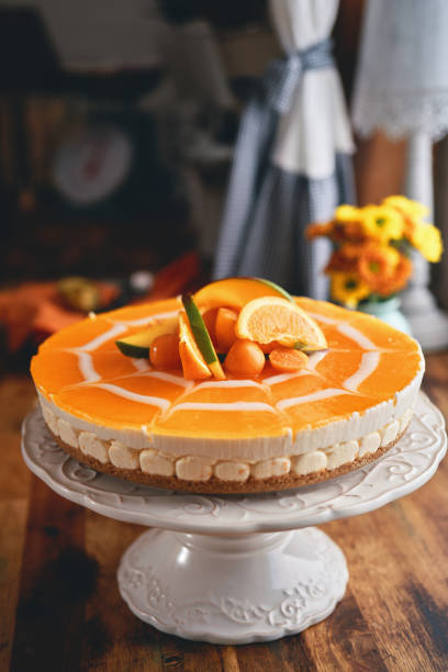 istock Creamy Orange Cheesecake with Whipped Cream 1357725625