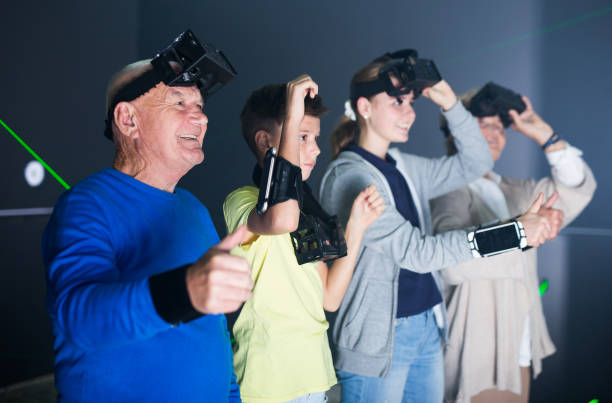 istock Family using virtual reality glasses delighted with videogames 1357725774