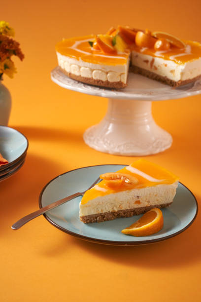 istock Creamy Orange Cheesecake with Whipped Cream 1357726793