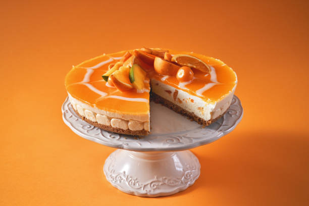istock Creamy Orange Cheesecake with Whipped Cream 1357726794