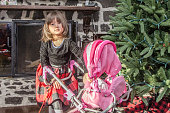 Young Girl with her baby doll stroller