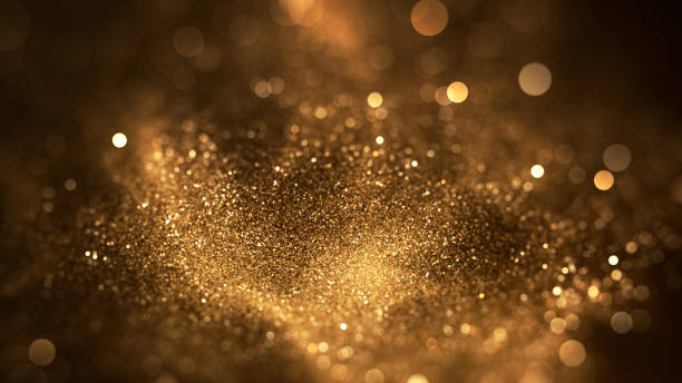 Abstract Glitter Background - Bokeh, Shallow Depth Of Field, Selective Focus - Gold Colored, Christmas, Celebration stock photo