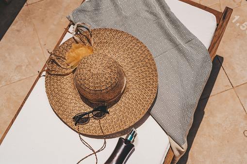 Summer holiday. Essentials for hot. Hat, sunglasses and sun screen