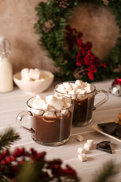 istock Two mugs with hot chocolate with white mini marshmallow 1357737140