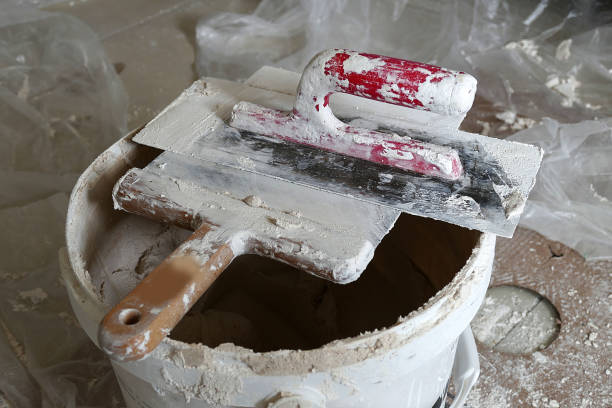 istock used dirty plaster materials, various materials of a plasterer for plaster, 1357739538