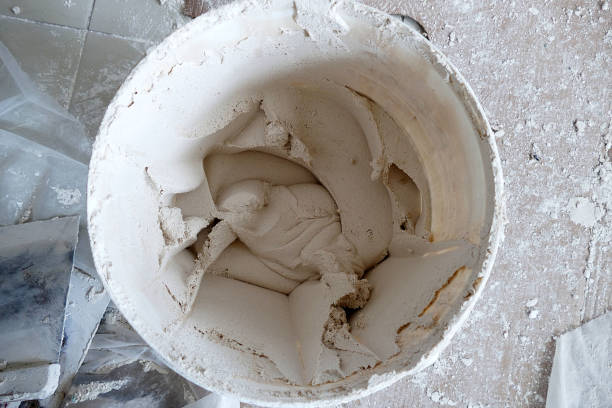 istock plaster for the wall prepared in a bucket, 1357739574