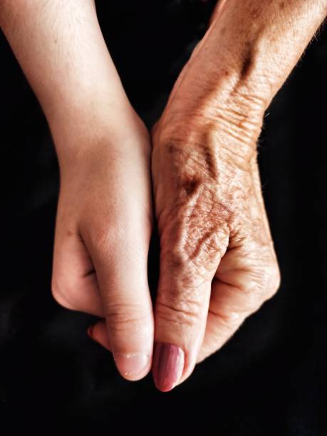 istock the hands of two generations 1357746460