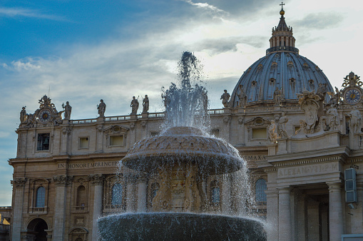 fontain on st. Peter's-square in Vatican city with beautiful sunlight