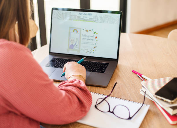 istock Author working on a website for her children's book 1357751536