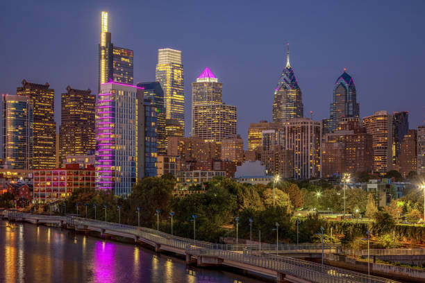 istock Philadelphia Downtown skyline at Night with the Schuylkill river. Beautiful Sunset Light. Schuylkill River Trail in Background. City skyline glows under the beautiful sunset light. Cityscape. PA, USA. 1357751823