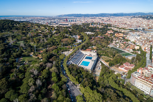 View Point Of Barcelona in Spain. On Montjuïc hill, Mirador de l'Alcalde, or Mayor's Viewpoint is a terraced belvedere overlooking the city of Barcelona. Public Swimming Pool in Background