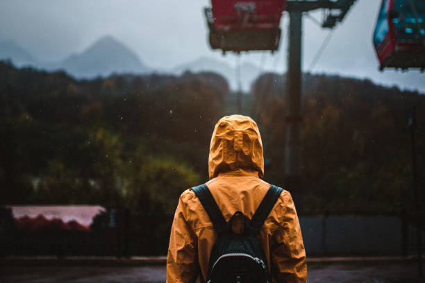istock Going to explore mountains in bad rainy weather 1357752563