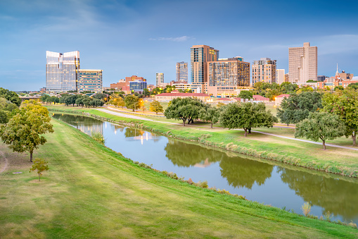 Skyline of downtown Fort Worth, Texas, USA with the Clear Fork Trinity River and Trinity Park.