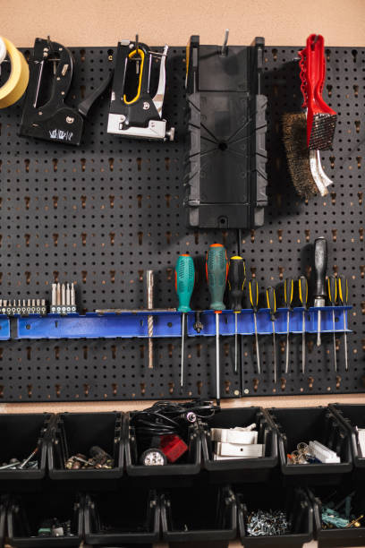 istock Close up stand with variety of modern tools in workshop isolated 1357759123