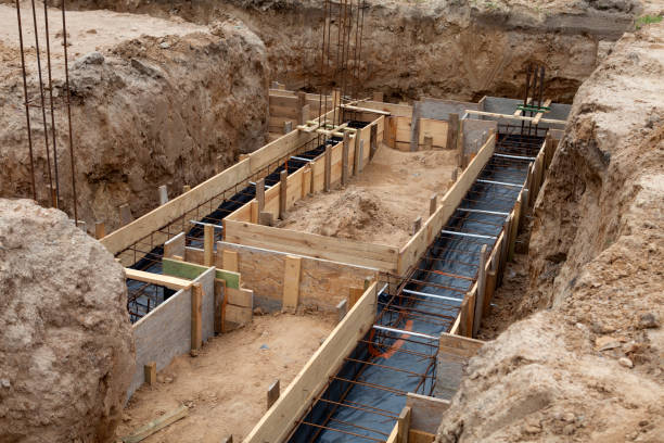 istock Preparation of formwork with reinforcement for a newly built house 1357762512
