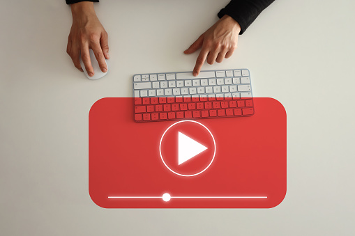 Video Marketing Concept.Hand pressing transparent button