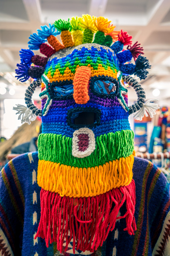Traditional woolen mask of the Devil Huma from the culture of Ecuador