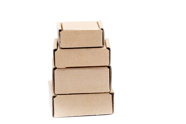istock Cardboard boxes of various sizes isolated on white background. 1357769646