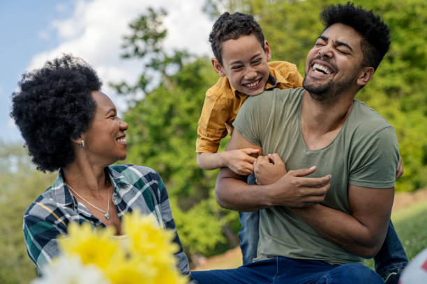 istock Happy family spending a spring day on picnic 1357771051