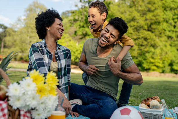 istock Happy family spending a spring day on picnic 1357772422