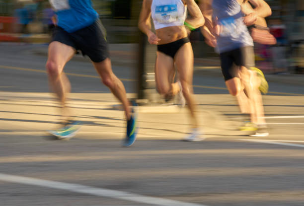 Distance Runners in an Urban Race stock photo