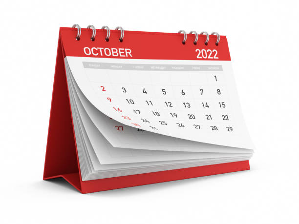 2022赤10月カレンダー白い背景のストック写真に立っています - october ストックフォトと画像