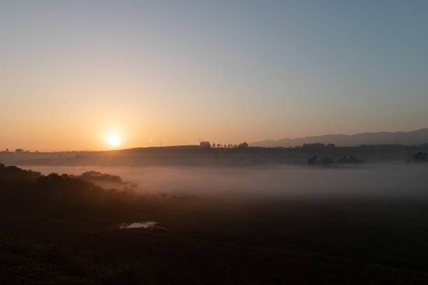 istock Sunrise over the road 1357781361